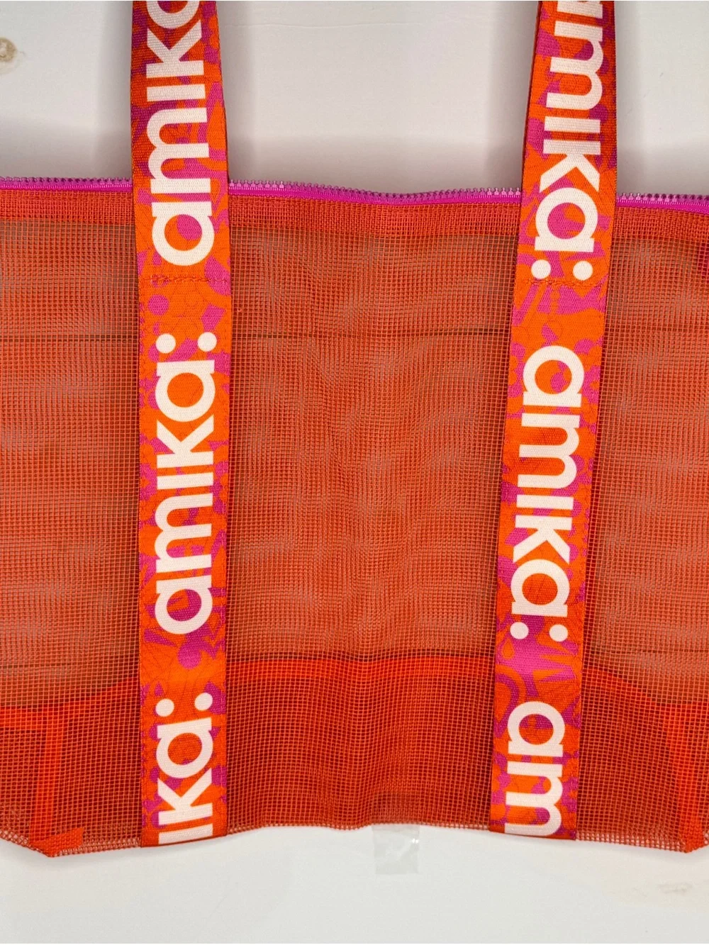 amika Orange Mesh Tote with Pink Zipper and Branded Straps
